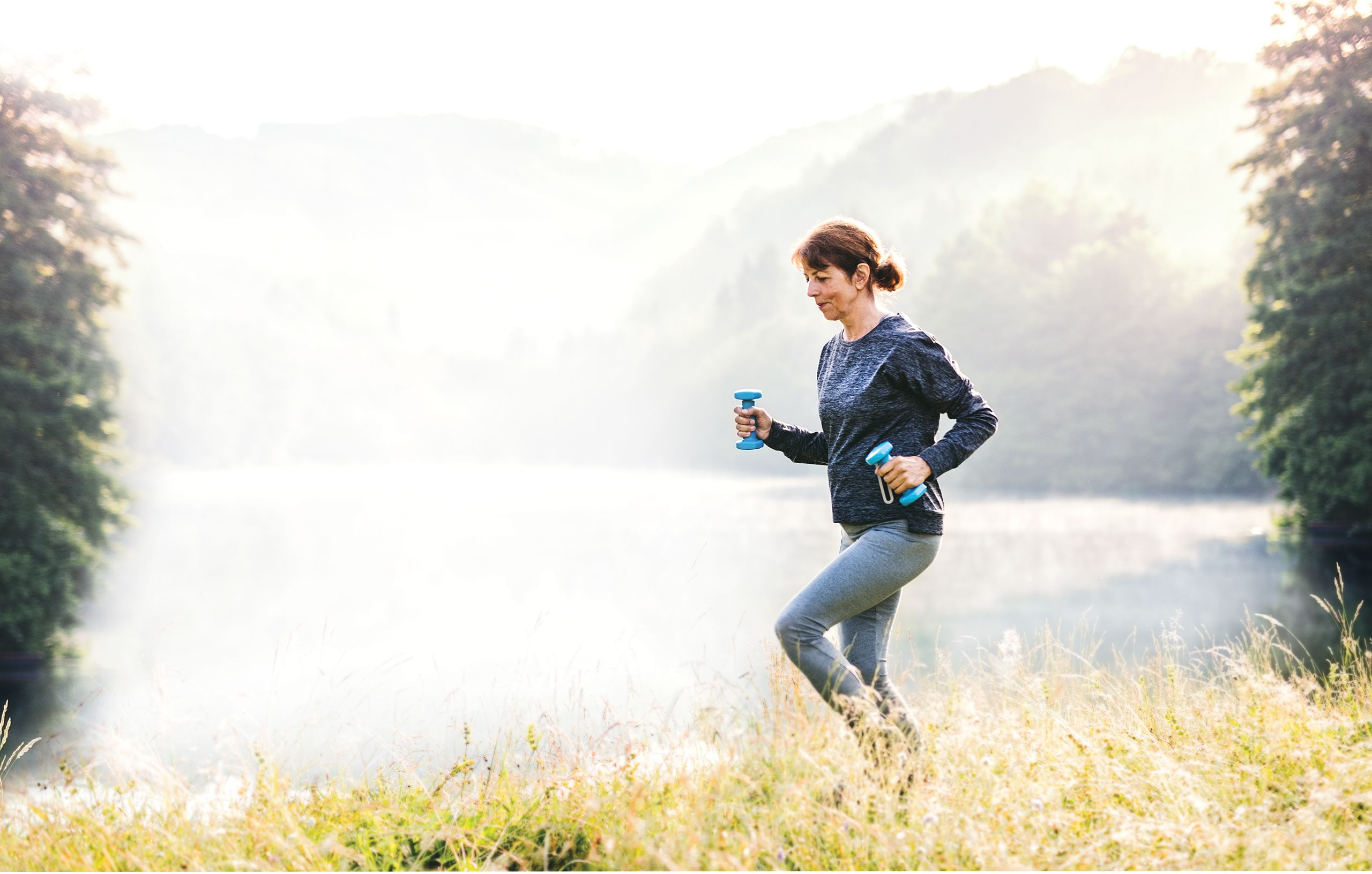 An image of a woman with gout working out in nature.
