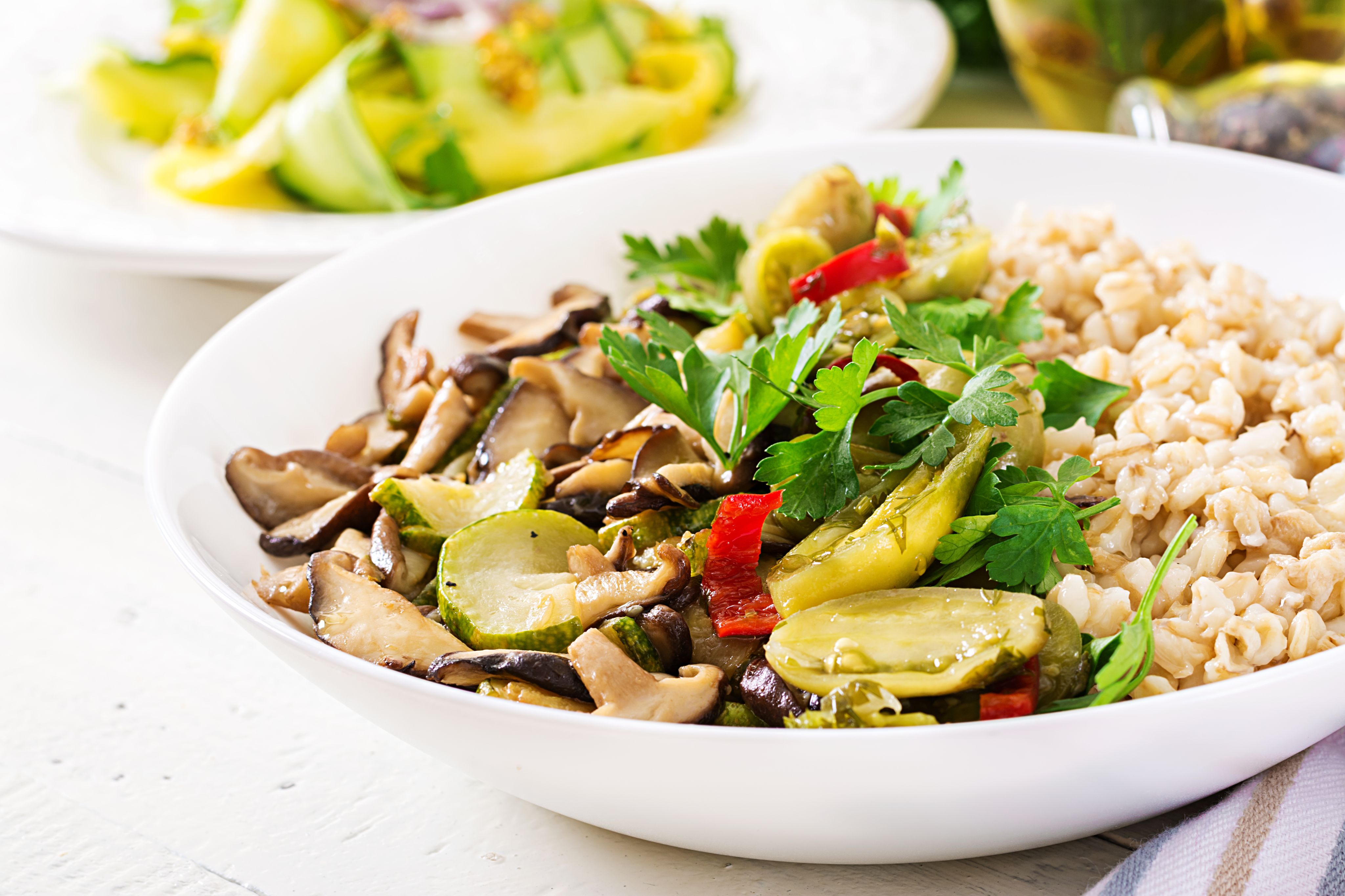 A healthy bowl of vegetables and farro. 