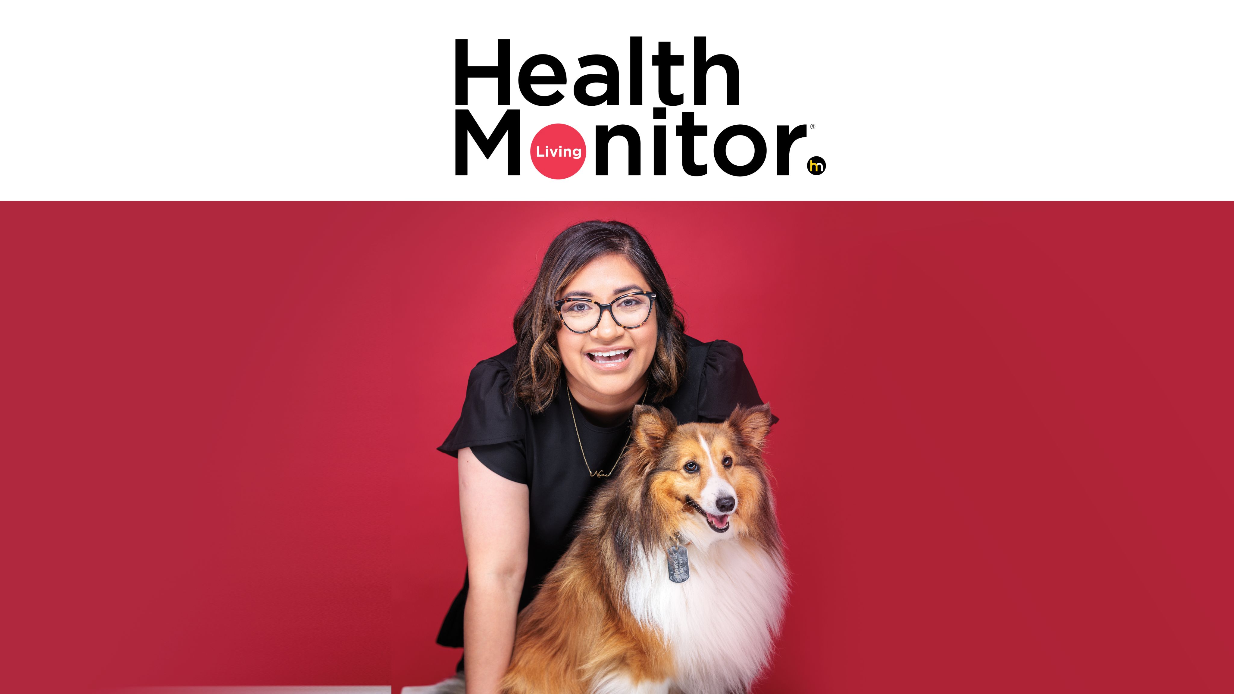 A woman with high cholesterol wearing glasses and posing with her puppy. 