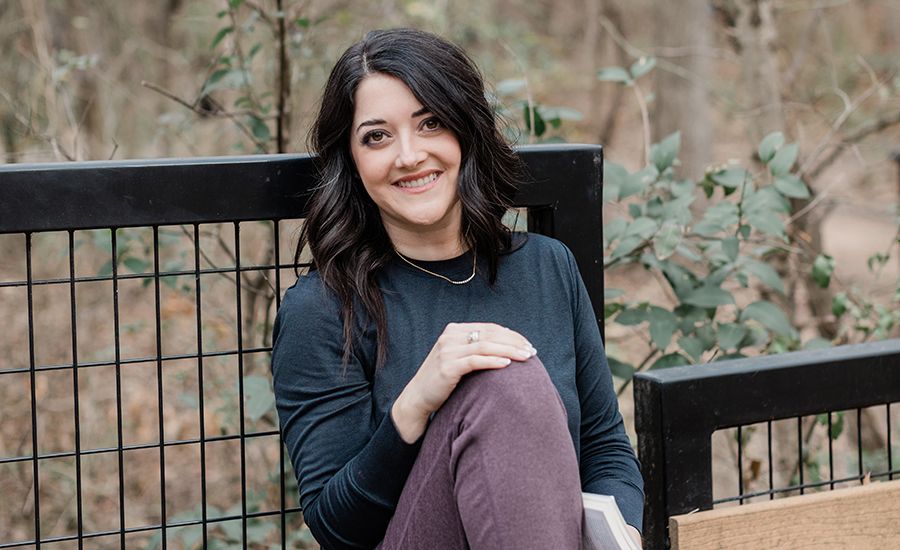 An image of a woman smiling with graves disease.